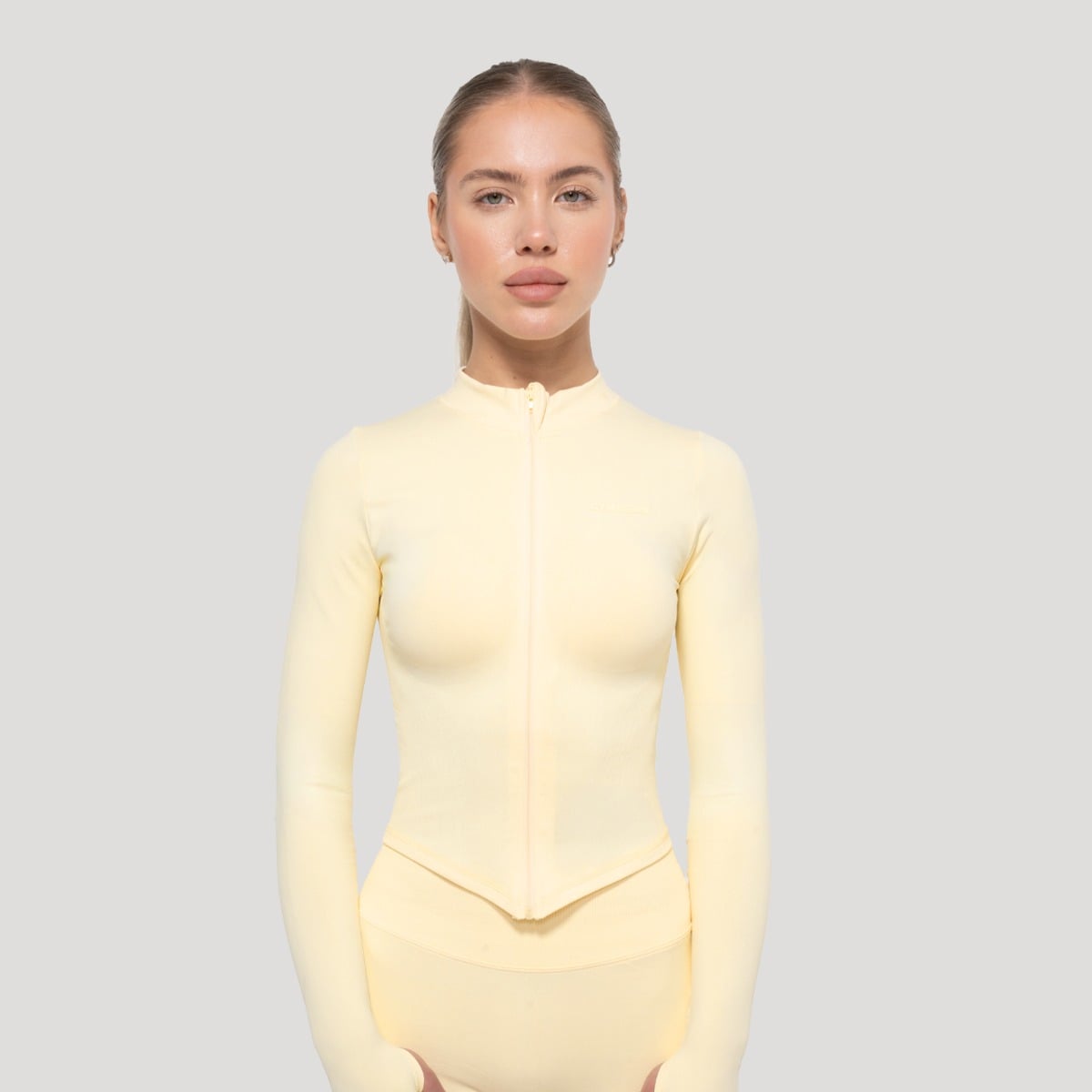 Top sport pentru femei Luma Butter Yellow - GymBeam